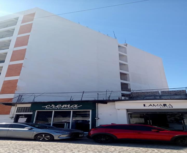 Cladding on the right side facade is finished