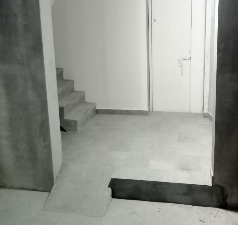 Ramp activation and floor installation in the basement lobby.