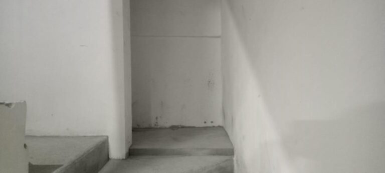 Completion of finishing details at all access points in the stairwell area