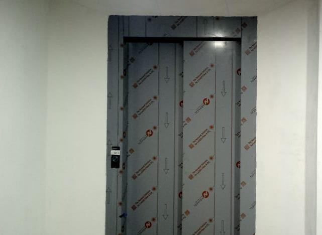 Patching and painting at each e levator stop are completed