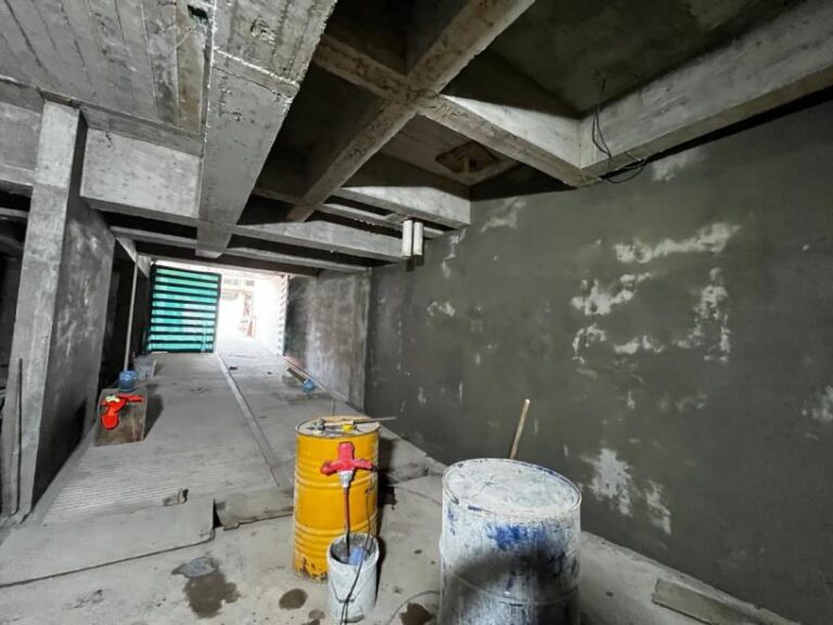 Excess materials and wires are removed from the walls to leave the final finish