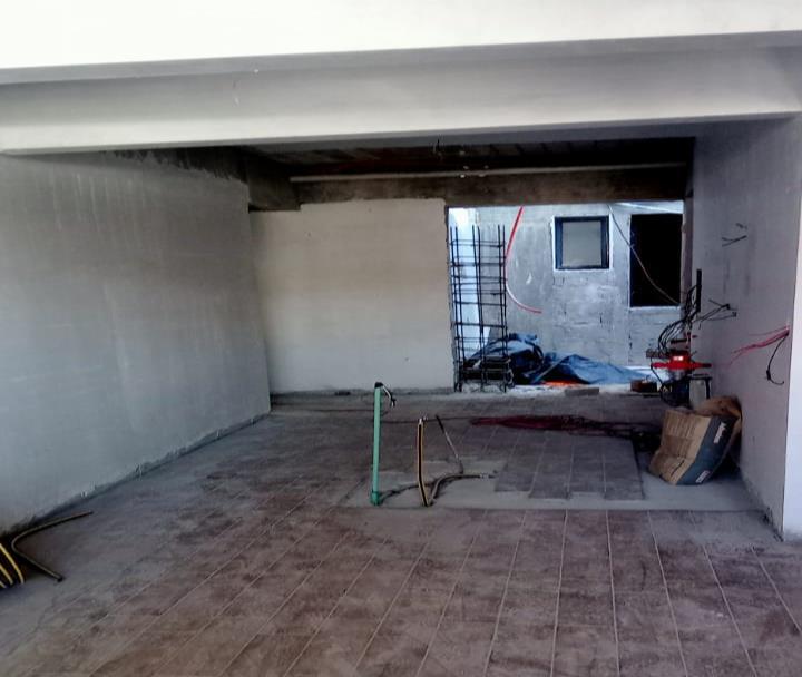 The flooring installation in unit 105 is finished