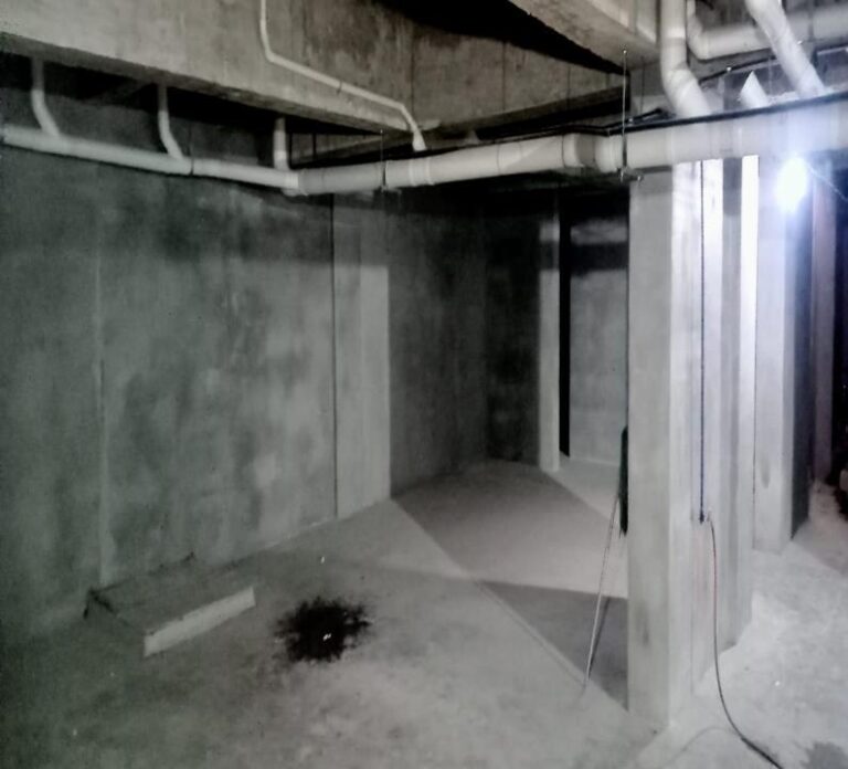 All basement wall cleaning and patching works have been completed
