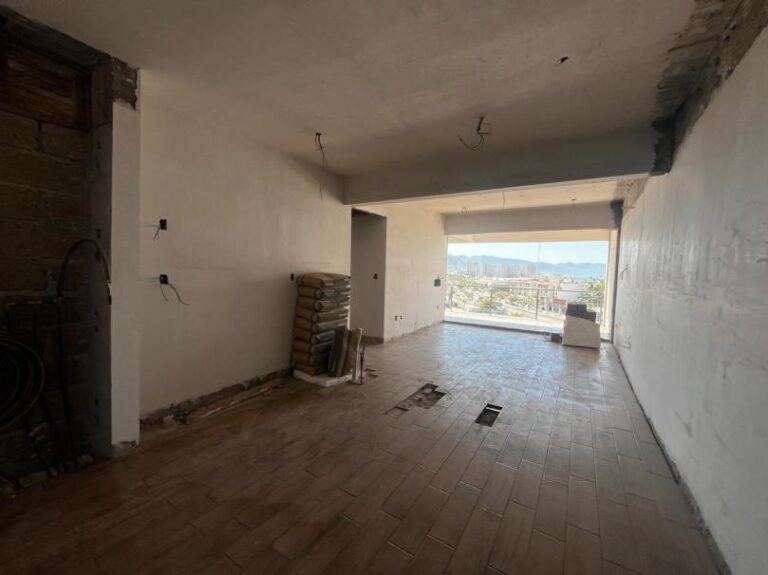 The installation of flooring in unit 601 is completed