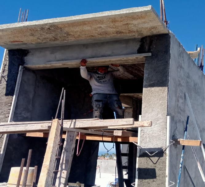 Plastering on stairs and elevator shaft of the rooftop level
